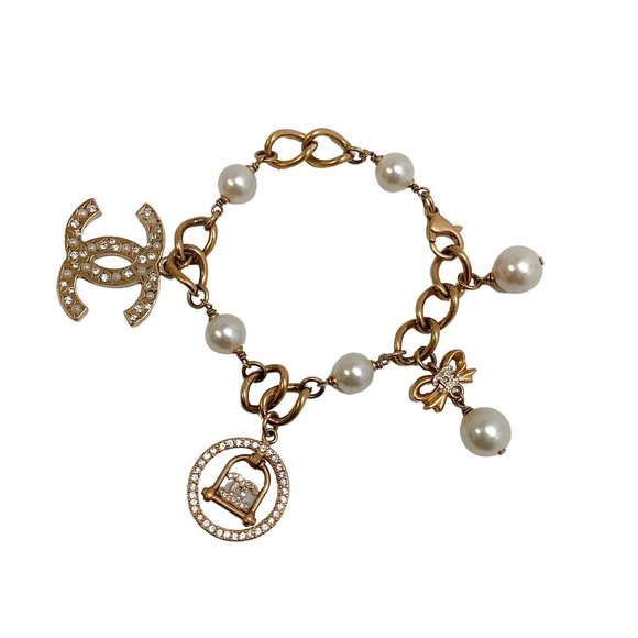 CHANEL Jewelry - Chanel Gold Pearl and Strass Charm Bracelet